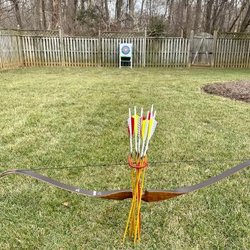 Jefferson Archery - My good-as-new bow, beautiful new custom-made carbon fiber arrows, and target all set up in my back yard.
