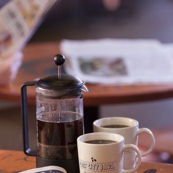 Port City Java - two cups of coffee and a newspaper - Coffee & Tea Near Me - Wilmington, North Carolina Port City Java - two cups of coffee and a newspaper - Coffee & Tea Near Me - Wilmington, North Carolina