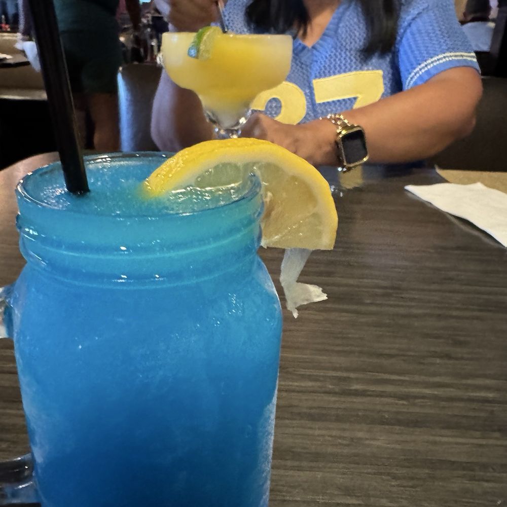 Benny the Bum's - Frozen Mango Margarita and Tito's Frozen blueberry lemonade. - American Near Me - Philadelphia, Pennsylvania