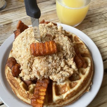 Wimberley Cafe - Chicken and Waffles-comes with sweet potato fries on it - American Near Me - Wimberley, Texas Wimberley Cafe - Chicken and Waffles-comes with sweet potato fries on it - American Near Me - Wimberley, Texas