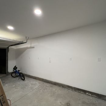 Nola Construction & Design - a garage with a bike in it - General Contractors Near Me Nola Construction & Design - a garage with a bike in it - General Contractors Near Me
