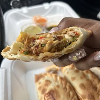Thimi's Empanadas - This is beautiful, colorful chicken empanada packed with meat - Empanadas Near Me - Chicago, Illinois