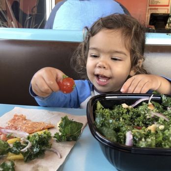 Tomato Pie Pizza Joint - My daughter enjoying their delicious Kale salad. - Pizza Near Me - Silver Lake, California Tomato Pie Pizza Joint - My daughter enjoying their delicious Kale salad. - Pizza Near Me - Silver Lake, California