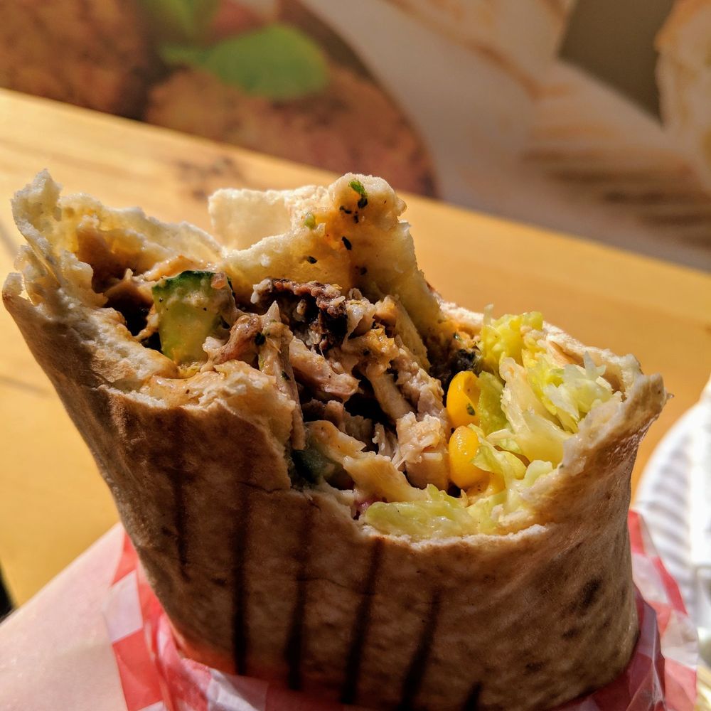 Best Bite Donair - Insides of a chicken donair - Poutineries Near Me - Vancouver, British Columbia Best Bite Donair - Insides of a chicken donair - Poutineries Near Me - Vancouver, British Columbia