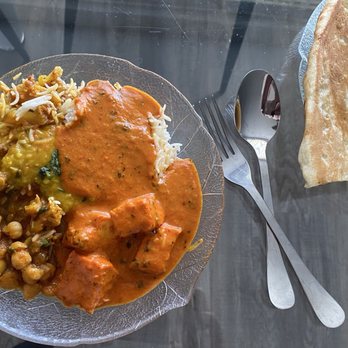 Mountain Grill - At home with my take out of the Vegan Platter and their wonderful rich and creamy Butter Chicken, along with very tasty Naan bread. - Indian Near Me - St. Catharines, Ontario