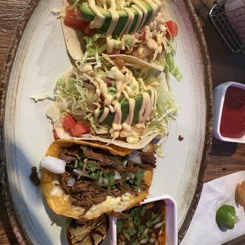 Westchester Taco Grill - 2 fried shrimp taco on a tortilla on the left Birria Taco on the right - Mexican Near Me - New Rochelle, New York Westchester Taco Grill - 2 fried shrimp taco on a tortilla on the left Birria Taco on the right - Mexican Near Me - New Rochelle, New York