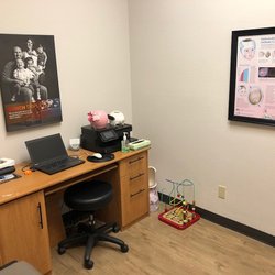 Patient room where cranial remolding bands are scanned and adjusted complete with toys to keep the little ones entertained.
