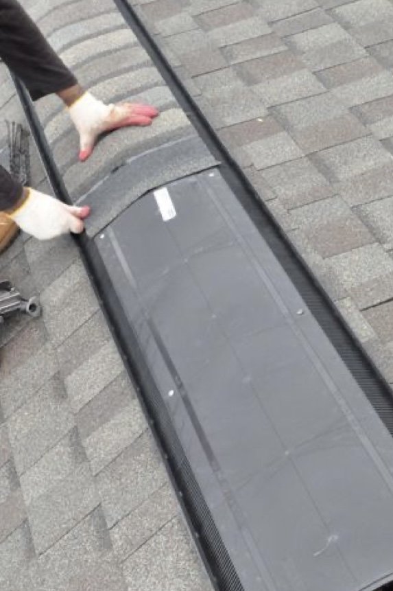 Slide of Richy’s Roofing Repair