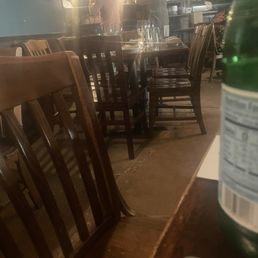 View of the chefs at work and brick oven. View of the chefs at work and brick oven.