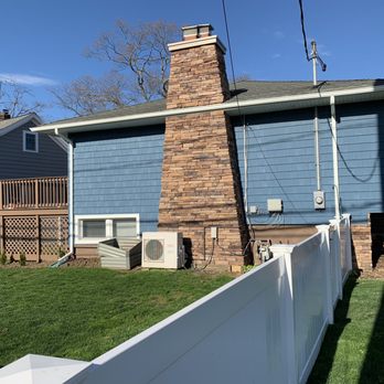 S C Home Designs - a white fence and a blue house - General Contractors Near Me - Bellmore, New York S C Home Designs - a white fence and a blue house - General Contractors Near Me - Bellmore, New York