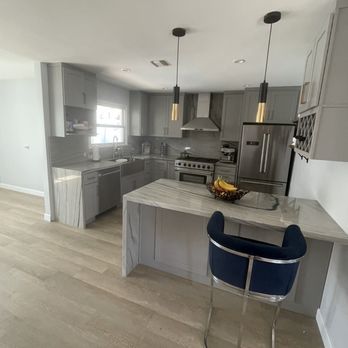 Integral Homes - Kitchen cabinets and quartzite countertops. - Cabinetry Near Me