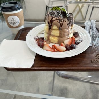 Nostimo Cafe & Tea - Nutellamisu mousse soufflé pancake - Coffee & Tea Near Me - Westminster, California Nostimo Cafe & Tea - Nutellamisu mousse soufflé pancake - Coffee & Tea Near Me - Westminster, California