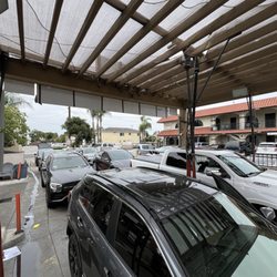 Orange Hand Car Wash - Cars lining up to get in.