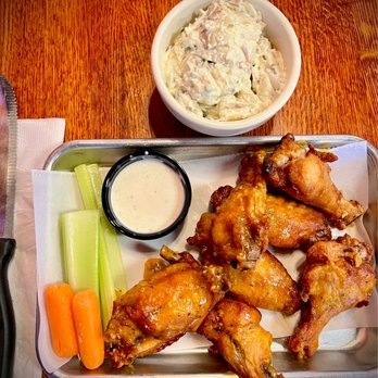Bluffs - Caribbean wings & loaded potato salad - Bars Near Me - Sevierville, Tennessee