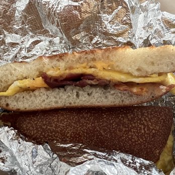 Manhattan Bagel - So called bacon egg cheese on a roll - Bagels Near Me - Bayonne, New Jersey