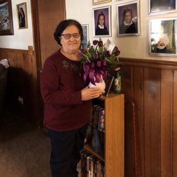 Mom holding flowers from Ramblin Roses