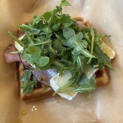 Waffles & Wildflowers - Savory morning waffle with Black Forest ham, brie, arugula and maple dijon.