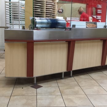 Papa Murphy's - Kida hard to tell but you can see the red bleach bucket on the counter where she is putting my pizza toppings. - Pizza Near Me - Snohomish, Washington Papa Murphy's - Kida hard to tell but you can see the red bleach bucket on the counter where she is putting my pizza toppings. - Pizza Near Me - Snohomish, Washington