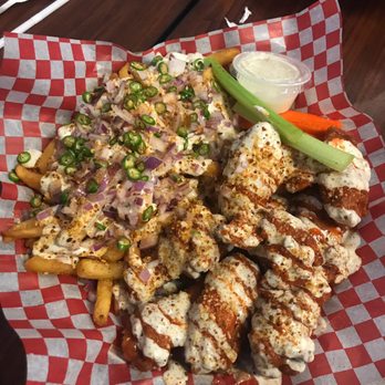 The Wing Spot - Spicy garlic parm with onion pepper fries. - Chicken Wings Near Me - Ajax, Ontario