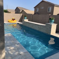 Northwest Pool & Spa - Our Amazing new pool with travertine tile and water feature