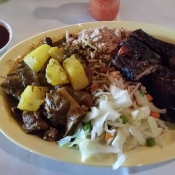Caribbean Jerk Cuisine - Curried goat and jerk chicken plate - Caribbean Near Me - Houston, Texas