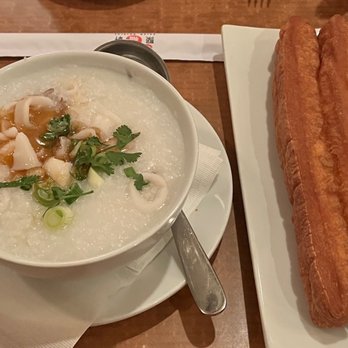 JOY Asian Cuisine - Seafood Congee with Chinese Donut. Congee bland. Donut is hard as a rock. - Asian Fusion Near Me - Indio, California JOY Asian Cuisine - Seafood Congee with Chinese Donut. Congee bland. Donut is hard as a rock. - Asian Fusion Near Me - Indio, California