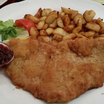 Opatija - Original "Wiener Schnitzel " with sauté potatoes - Bavarian Near Me - Munich, BY Opatija - Original "Wiener Schnitzel " with sauté potatoes - Bavarian Near Me - Munich, BY