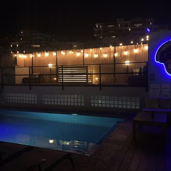 Mayan Monkey - Pool area at night - Hostels Near Me - Cabo San Lucas, BCS Mayan Monkey - Pool area at night - Hostels Near Me - Cabo San Lucas, BCS