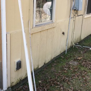 K&J Construction - Part of trim left outside in rain - Flooring Near Me