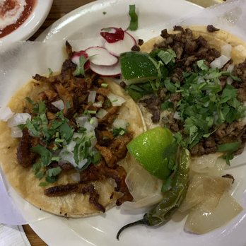 Los Comales - Left: pastor taco (pork) Right: steak taco - Cocktail Bars Near Me - Memphis, Tennessee Los Comales - Left: pastor taco (pork) Right: steak taco - Cocktail Bars Near Me - Memphis, Tennessee