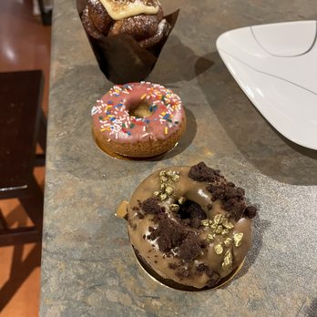 Purple Horseshoe Baking - three donuts on a counter - Donuts Near Me - Oakville, Ontario Purple Horseshoe Baking - three donuts on a counter - Donuts Near Me - Oakville, Ontario