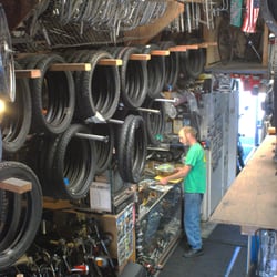 Myron's Mopeds - Shaun at front counter in 2011