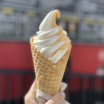 Lane's Lemonade & Dairy Bar - Orange Vanilla Twist in a Waffle Cone - Ice Cream & Frozen Yogurt Near Me - Dunedin, Florida Lane's Lemonade & Dairy Bar - Orange Vanilla Twist in a Waffle Cone - Ice Cream & Frozen Yogurt Near Me - Dunedin, Florida