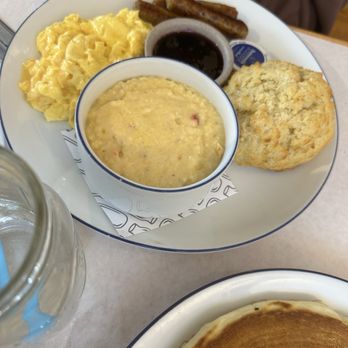 Buttermilk Kitchen - The Standard - Scrambled Eggs, Pimento Cheese Grits, Chicken Sausage and a Buttermilk Biscuit - Breakfast & Brunch Near Me - Atlanta, Georgia Buttermilk Kitchen - The Standard - Scrambled Eggs, Pimento Cheese Grits, Chicken Sausage and a Buttermilk Biscuit - Breakfast & Brunch Near Me - Atlanta, Georgia