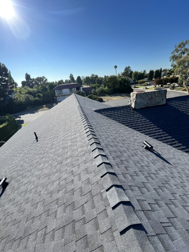 Slide of Goliath Roofing