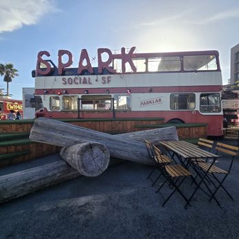 Spark Social SF - double decker bus with tables and eating spots inside - Food Trucks Near Me - San Francisco, California