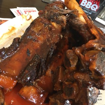 Dallas BBQ Washington Heights - Couldn't make this thing look pretty in the photo. It's a display of how messy you're going to get and yeah. It's big. - Barbeque Near Me - New York, New York