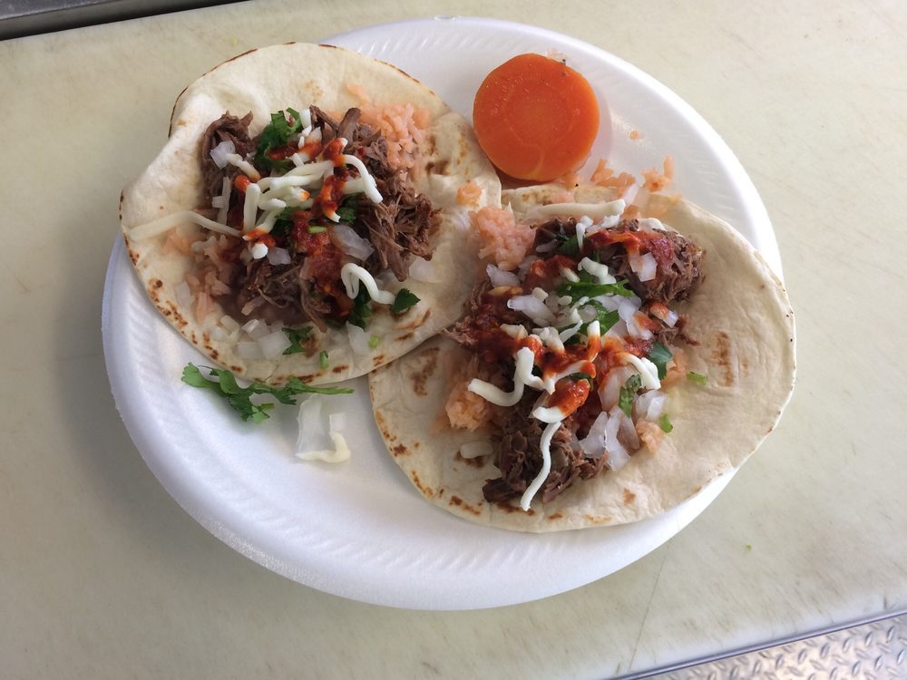 Rico Taqueria Logo