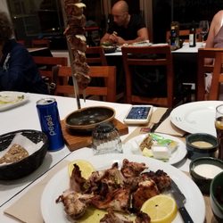 Carvoaria Jacto - Rabbit in foreground.  Pork tenderloin in background.