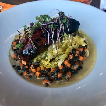 Weights + Measures - House made wood grilled beef sausage with pickled cabbage and French lentils - Bars Near Me - Houston, Texas