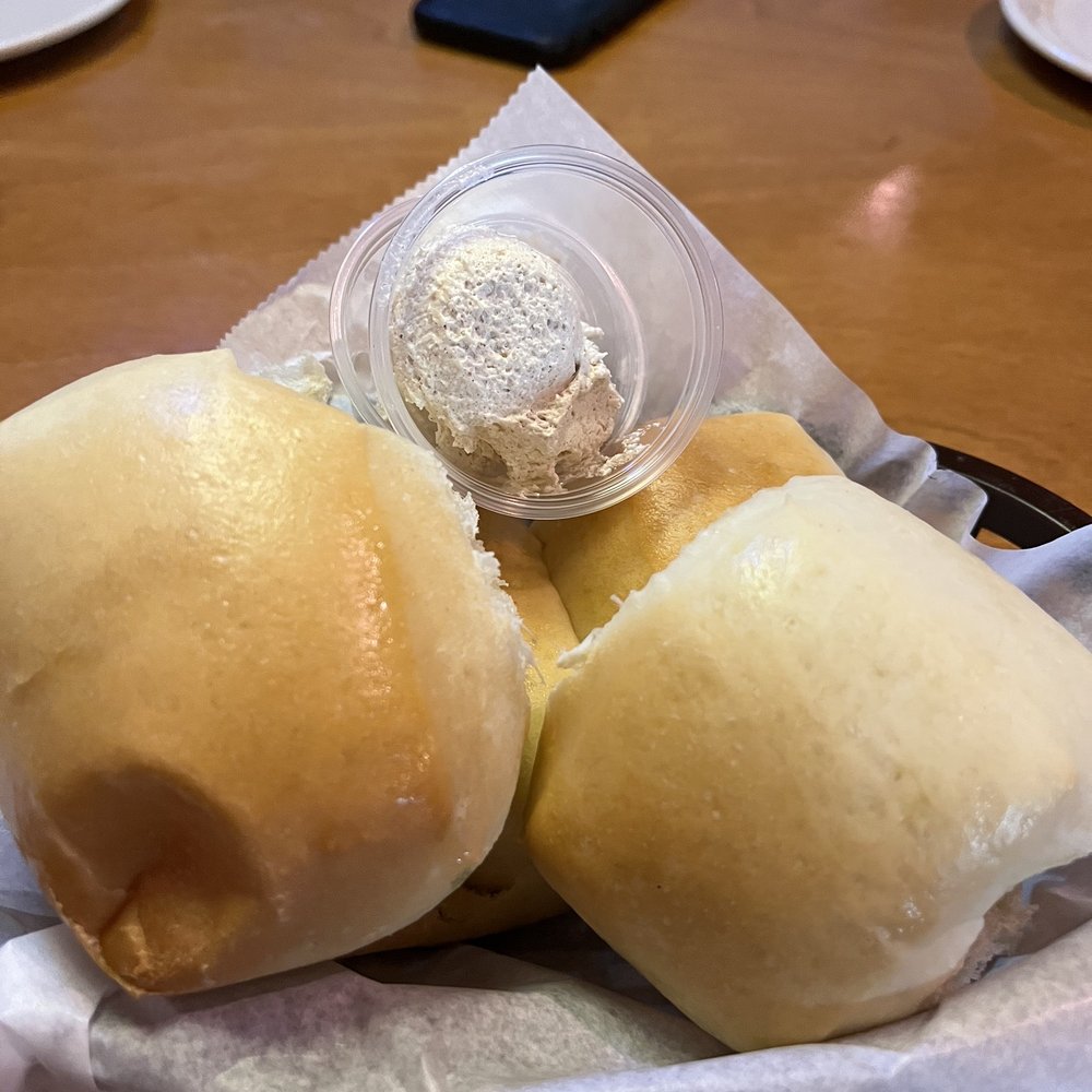 Texas Roadhouse - The complimentary best fresh baked bread with cinnamon honey butter - Steakhouses Near Me - Kingwood, Texas Texas Roadhouse - The complimentary best fresh baked bread with cinnamon honey butter - Steakhouses Near Me - Kingwood, Texas