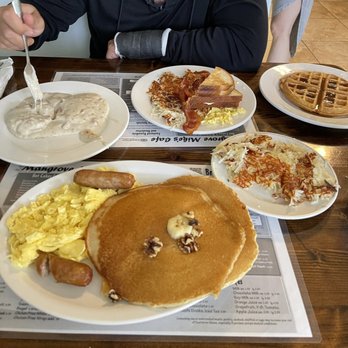 Mangrove Mike's - Banana nut pancakes with eggs, sausage and hash browns. Biscuits and gravy and a waffle - Breakfast & Brunch Near Me - Islamorada, Florida Mangrove Mike's - Banana nut pancakes with eggs, sausage and hash browns. Biscuits and gravy and a waffle - Breakfast & Brunch Near Me - Islamorada, Florida