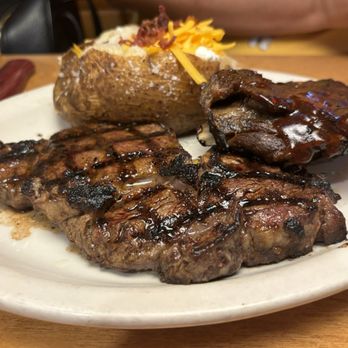 Texas Roadhouse - Ribeye* 12oz & Ribs - Steakhouses Near Me - Friendswood, Texas Texas Roadhouse - Ribeye* 12oz & Ribs - Steakhouses Near Me - Friendswood, Texas