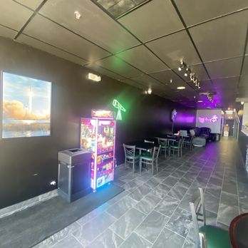 EternaTea Boba - Main seating with lounge rocking chairs (Very Comfy). - Bubble Tea Near Me - Hoffman Estates, Illinois