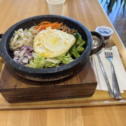 Dolsot w/ tofu and over well egg Dolsot w/ tofu and over well egg