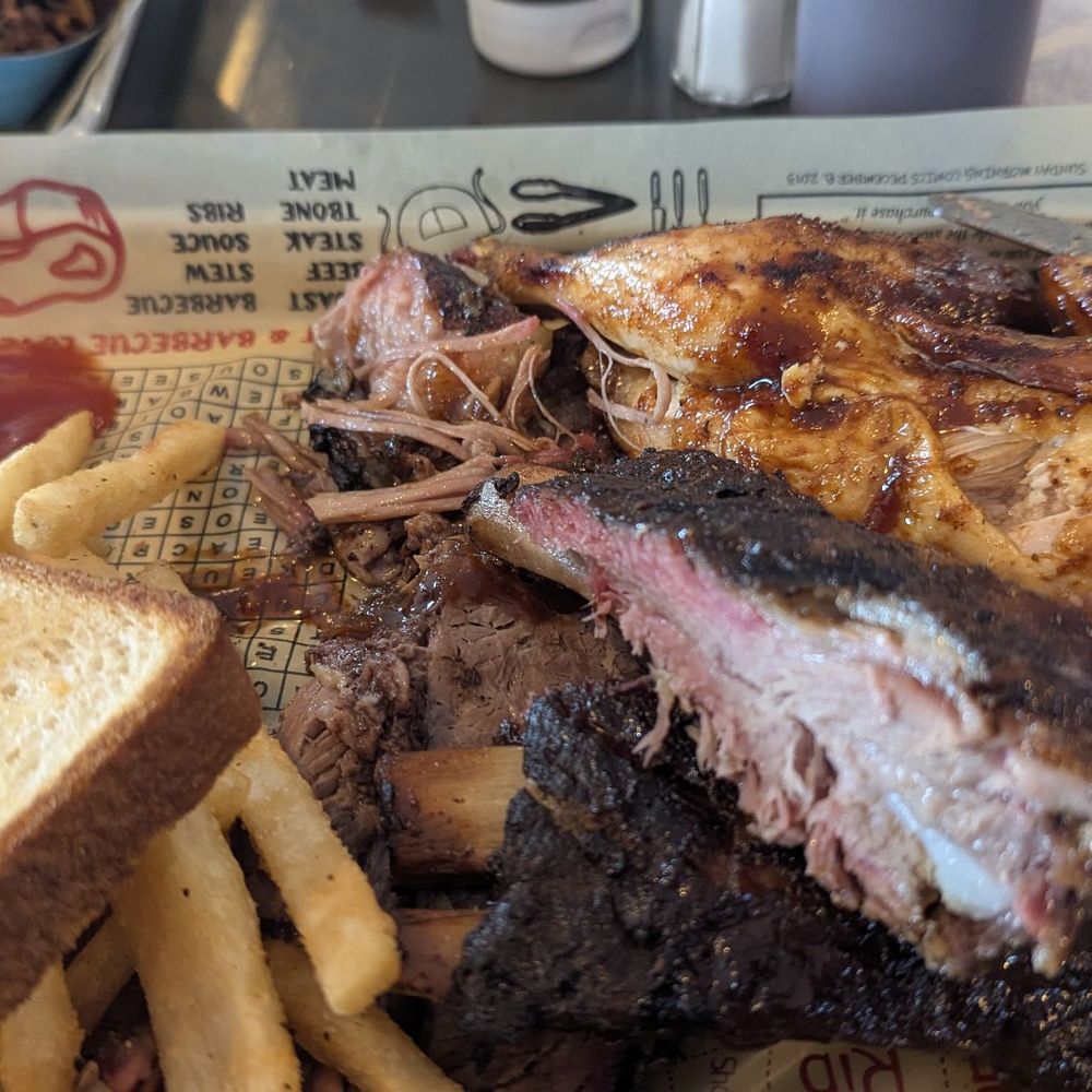 Three Meat Plate with brisket, ribs, and chicken. Three Meat Plate with brisket, ribs, and chicken.