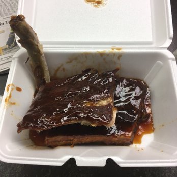 We Be Ribs - Half rack of ribs.  One rib eaten, couldn't resist before I took a picture.  Tender and fall off the bone. - Food Trucks Near Me