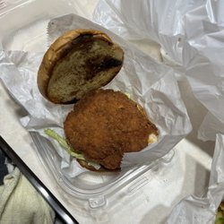 Mr Beast Burger - Nashville spicy chicken tender sandwich. No tenders. No spice, but hey I got wilted lettuce and pickles.
