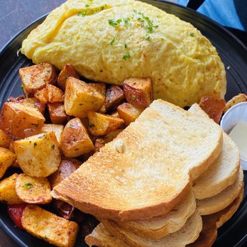 The Hideout Kitchen - Bacon and Cheese Omelette with country potatoes and sourdough bread - New American Near Me - Lafayette, California The Hideout Kitchen - Bacon and Cheese Omelette with country potatoes and sourdough bread - New American Near Me - Lafayette, California