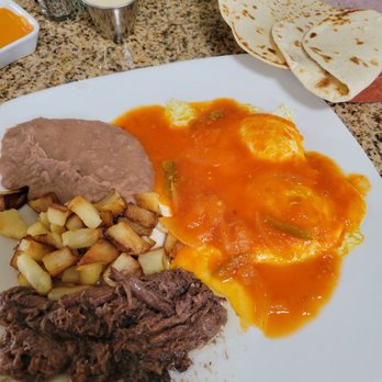 Manguitos Mexican Restaurant - Huevos rancheros con barbacoa and flour tortillas - Breakfast & Brunch Near Me - San Antonio, Texas Manguitos Mexican Restaurant - Huevos rancheros con barbacoa and flour tortillas - Breakfast & Brunch Near Me - San Antonio, Texas
